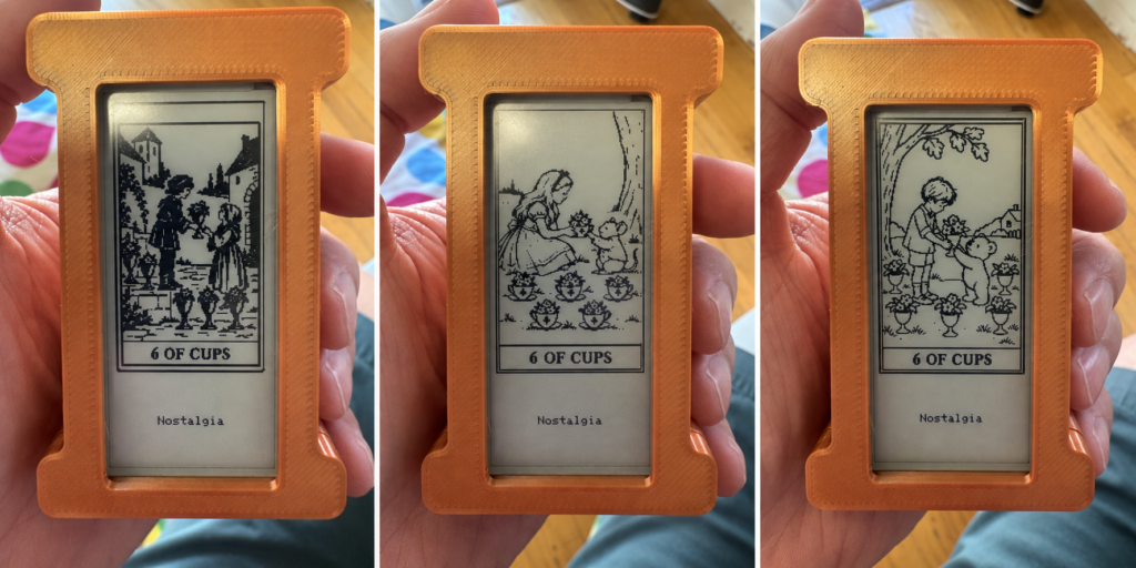 Three photos of a hand holding an orange 3D-printed frame containing an e-ink display showing three different artistic interpretations of the "6 of Cups" tarot card, each labeled "Nostalgia" beneath the card image.